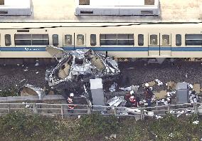 Train derailment after collision with car