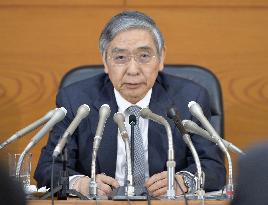 BOJ stands pat, more upbeat economic view dents easing speculation