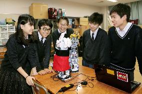 Junior high school students develop sign language robot