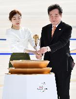 Olympic flame arrives in S. Korea for 2018 Pyeongchang Winter Games