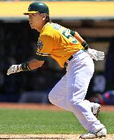 Athletics' Matsui scores 1,500th run