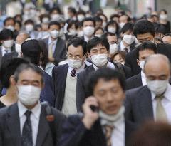 New-flu infections on increase in Japan, Aso seeks calm response