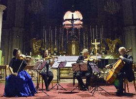 String quartet perform with instruments made from tsunami debris