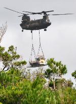 SDF helicopters airlift equipment to build U.S. helipads in Okinawa