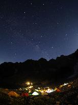 Climbers camp on night before Mountain Day holiday