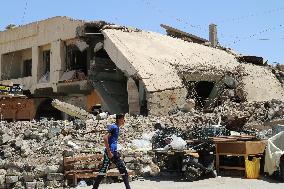Iraq's Mosul, month after being liberated