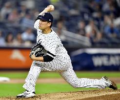 Baseball: Tanaka earns 12th win as Yankees beat Orioles