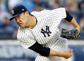 Baseball: Tanaka fans 14 en route to 8th win as Yankees down Rays