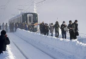 Train stranded by heavy snowfall in Japan