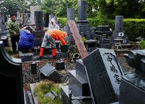 Gravestones damaged by powerful quake in Hokkaido