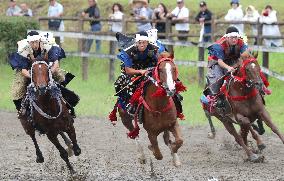 Warriors gallop on horseback