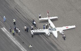 Small plane collapses on landing at Nagasaki airport