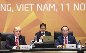 Pacific Rim leaders discuss free trade, Trump makes debut