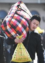 Exodus from Beijing begins ahead of Spring Festival