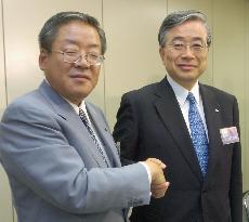 Promise, Sanyo Shinpan announce integration agreement