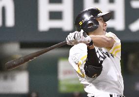 Yanagita homers, drives in 4 as Hawks regain PL lead