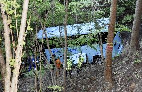 Minibus slides down mountain slope in Japan