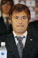 Japan's World Cup squad return home from South Africa