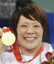 Japan's Tanimoto strikes gold to defend judo crown in Beijing