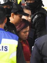 Malaysia charges 2 women with murder in Kim's death