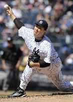 Tanaka gets no-decision in Yankees' victory