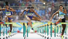 Olympics: Rollins leaps to gold in women's 100m hurdles