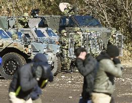 Media shown Japan troop drills to protect citizens abroad