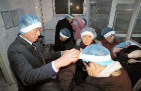 Japan fact-finding team visits Hebei over food poisoning