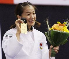 Tani wins gold in 48 kg weight class