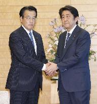 Japan ruling, opposition blocs agree on extra budget after quakes