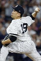 Tanaka keeps Yankees alive in ALDS