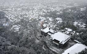 Tourist city Kyoto covered with snow