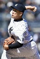 Tanaka solid but gets no-decision on Opening Day