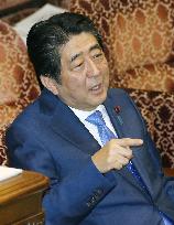 Abe Cabinet approval rate falls slightly amid land deal scandal