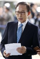 S. Korea's ex-leader Lee appears before prosecutors over bribery