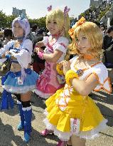 'Precure' cosplayers pose