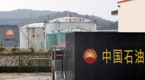 China puts in place U.N. limits on petroleum exports to North Korea