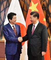 Japan's Abe, China's Xi meet over bilateral ties, N. Korea