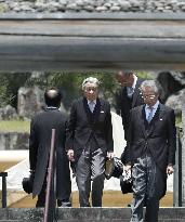 Ex-Japan emperor visits family grave