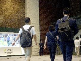 Casual wear campaign at Japanese bank