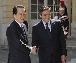 Kan greeted by French PM Fillon