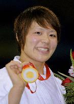 Japan's Tanimoto strikes gold to defend judo crown in Beijing