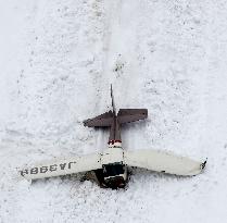 4 aboard found dead from wreckage of plane in Northern Japan Alps