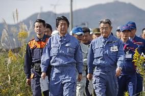 Japan PM Abe visits typhoon-affected areas