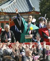 Actor Matsuyama throws beans at temple