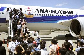 ANA's 'Gundam' plane departs for 30th anniversary