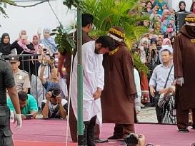 2 men in Indonesia's Aceh publicly caned for gay sex
