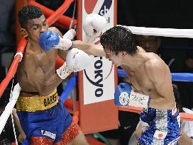 Boxing: Japan's Taguchi defended WBA light flyweight title