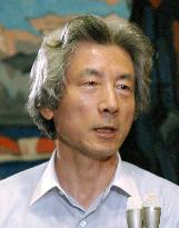 Koizumi warns LDP members against opposing postal bills