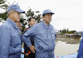 Japan PM Abe visits typhoon-affected area